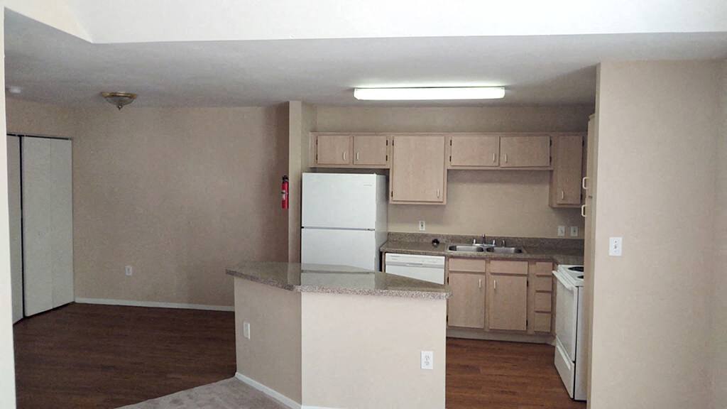 A spacious kitchen and kitchen counter at the Tidwell Estates Apartments in Houston, Texas.